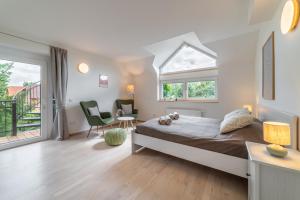Postel nebo postele na pokoji v ubytování TinyGreens B & B