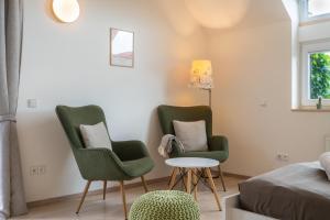 Posezení v ubytování TinyGreens B & B