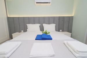 A bed or beds in a room at Villa Baycasa