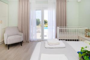 A bed or beds in a room at Villa Baycasa