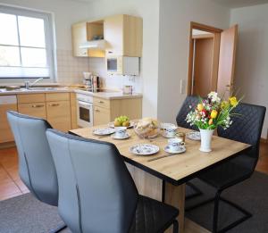 Kuchyň nebo kuchyňský kout v ubytování Familienurlaub Natur- & Zentrumsnah im Granitzhof App 02