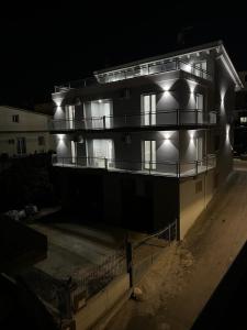a large building with lights on it at night at LaVenere da Gigi e Patty in San Salvo