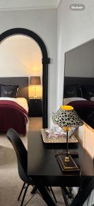 Voodi või voodid majutusasutuse Park Hotel & Vinbar toas