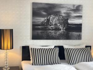 Voodi või voodid majutusasutuse Park Hotel & Vinbar toas