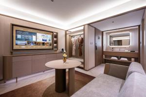 Posezení v ubytování Crystal Orange Hotel Qingdao May Fourth Square Seaview Branch