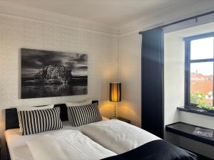 Voodi või voodid majutusasutuse Park Hotel & Vinbar toas
