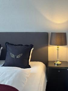 Voodi või voodid majutusasutuse Park Hotel & Vinbar toas