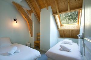 Postel nebo postele na pokoji v ubytování Auberge du Freney