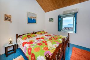 Postel nebo postele na pokoji v ubytování Fisherman's Guest house Galeb