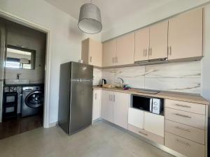 Kuchyň nebo kuchyňský kout v ubytování Ariadne Complex Apartment AD7-08