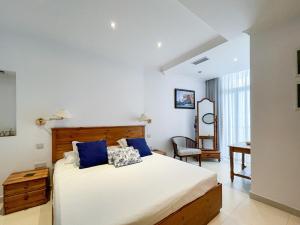 Postel nebo postele na pokoji v ubytování Sliema Apt - Leisure & Live