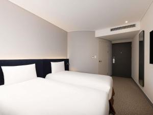 ibis Ambassador Seoul Insadong-Newly renovated in 2025にあるベッド