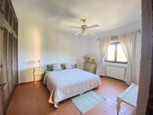 En eller flere senge i et værelse på REf 10 VILLA DOS AQUAS + 21 billeder