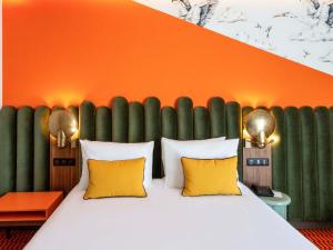 Postel nebo postele na pokoji v ubytování Mercure Shéhérazade Rabat