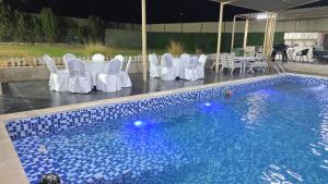 Bazén v ubytování استراحة دار العين nebo v jeho okolí + 9 fotografií