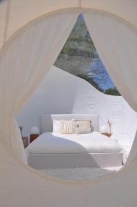 Una cama o camas en una habitación de Noortweghe GLAMPING