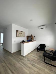 Posezení v ubytování Hostal Malia