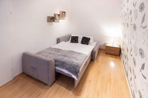 En eller flere senge i et værelse på Premium Deluxe Zentrum nähe