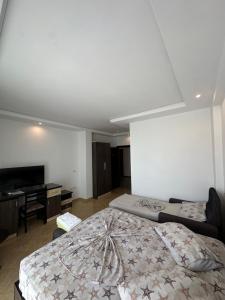 Rúm í herbergi á Hotel Zverneci