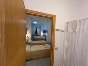 Postel nebo postele na pokoji v ubytování Su Marmuri