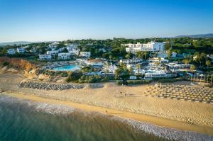 an aerial view of a beach with a resort at Vale Do Lobo Resort in Vale do Lobo