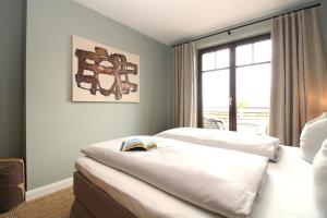 Katil atau katil-katil dalam bilik di Hafen-Appartement Fritz