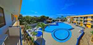 Bazén v ubytování Hotel Club del Sol nebo v jeho okolí