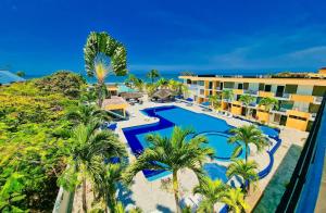 Bazén v ubytování Hotel Club del Sol nebo v jeho okolí