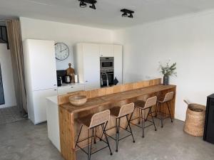 A kitchen or kitchenette at Casa Trece