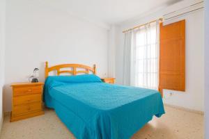 Katil atau katil-katil dalam bilik di Port Sa Playa beach apartment