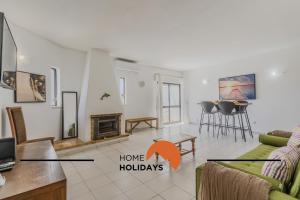 Μια τηλεόραση ή/και κέντρο ψυχαγωγίας στο #295 Beco do Sol 29A by Home Holidays