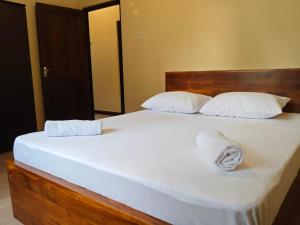Postel nebo postele na pokoji v ubytování Candy Villa