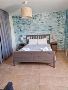 Ένα ή περισσότερα κρεβάτια σε δωμάτιο στο Why Not Houses Golf Esuri
