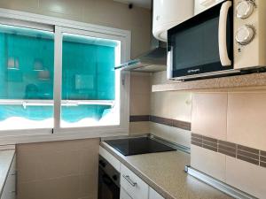 Kuchyňa alebo kuchynka v ubytovaní Apartamento super luminoso