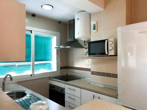 Kuchyňa alebo kuchynka v ubytovaní Apartamento super luminoso