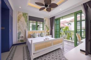 เตียงในห้องที่ Lotus Villa Khem beach Phu Quoc +122 ภาพ