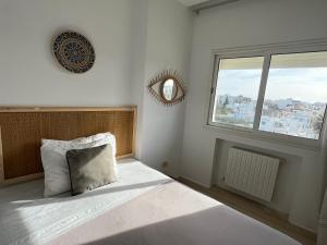 Postel nebo postele na pokoji v ubytování Mahdia sea front 3 + 2 fotografie