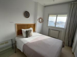 Postel nebo postele na pokoji v ubytování Mahdia sea front 3