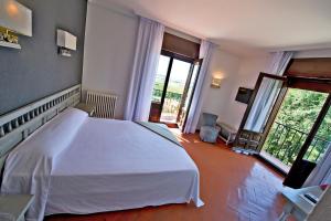 Hospedium Hotel Juan II客房内的一张或多张床位