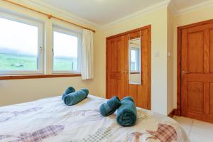 Ένα ή περισσότερα κρεβάτια σε δωμάτιο στο 1 Bed in Glenhinnisdal oc-t32341