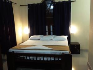 Gambar di galeri bagi Hotel O Cardamom Rock Inn di Thekkady
