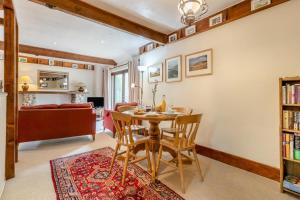 a dining room with a table and chairs at 2 Bed in Sharrington oc-h32406 in Sharrington
