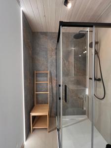 a bathroom with a shower with a wooden ladder at Rzecznicy Relaksu in Długosiodło +86 photos