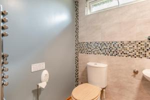 a bathroom with a toilet and a sink at 2 Bed in Keddington oc-t32411 in Louth +11 photos
