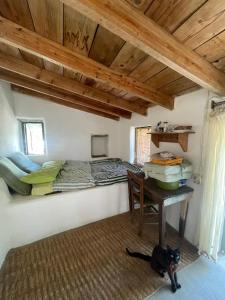 a bedroom with a bed and a desk in a room at Circadia in Prongíon