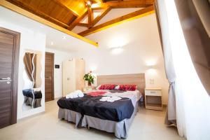 Postel nebo postele na pokoji v ubytování B&B Villa Marsico
