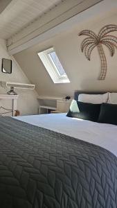 Postel nebo postele na pokoji v ubytování Villa Hop Zandvoort