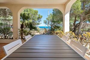 L'Ametlla de MarにあるHauzify I Casa l'Estanyの家から海岸に通じる通路 +18枚の写真