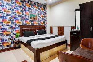 Ένα ή περισσότερα κρεβάτια σε δωμάτιο στο Hotel O BG Hotel