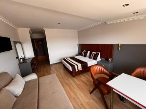 A bed or beds in a room at Blue Istanbul Hotel Taksim
